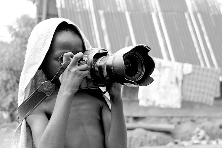 Fotograferen locals: camera weggeven