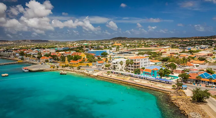 Wereldbol speel piano Auto Goedkope vakantie Bonaire 2022 - dé VakantieDiscounter