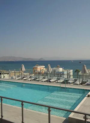 Astron Suites, Kos-Stad